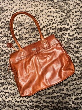 “Spikes and Sparrow” genuine leather shoulder bag or laptop bag